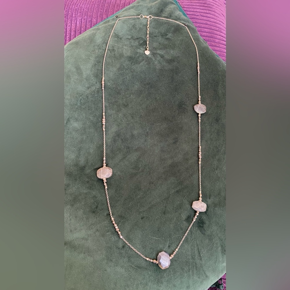 Grey natural stones on silver beaded chain.